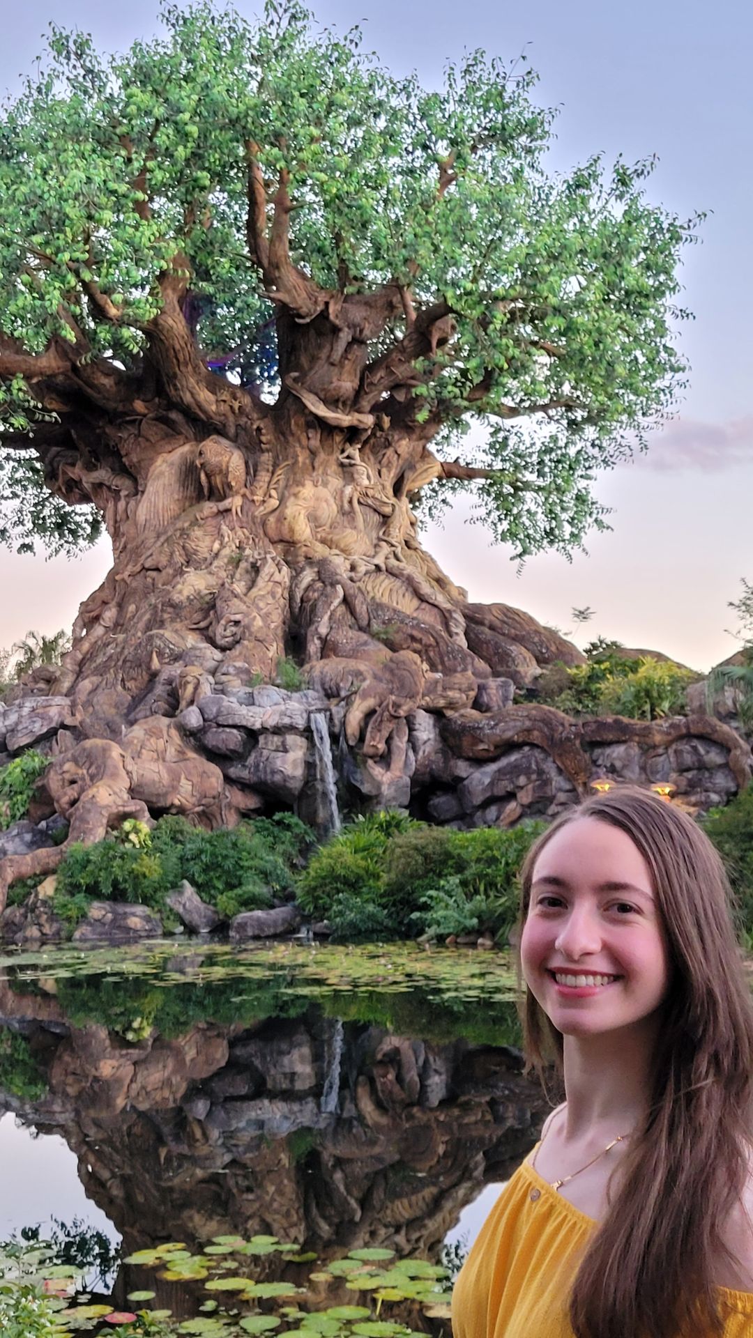 Salma Marzouk smiling, standing in front of a tree in Orlando.