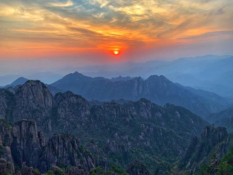 View of sunset above Mount Huang, Anhui Province, China