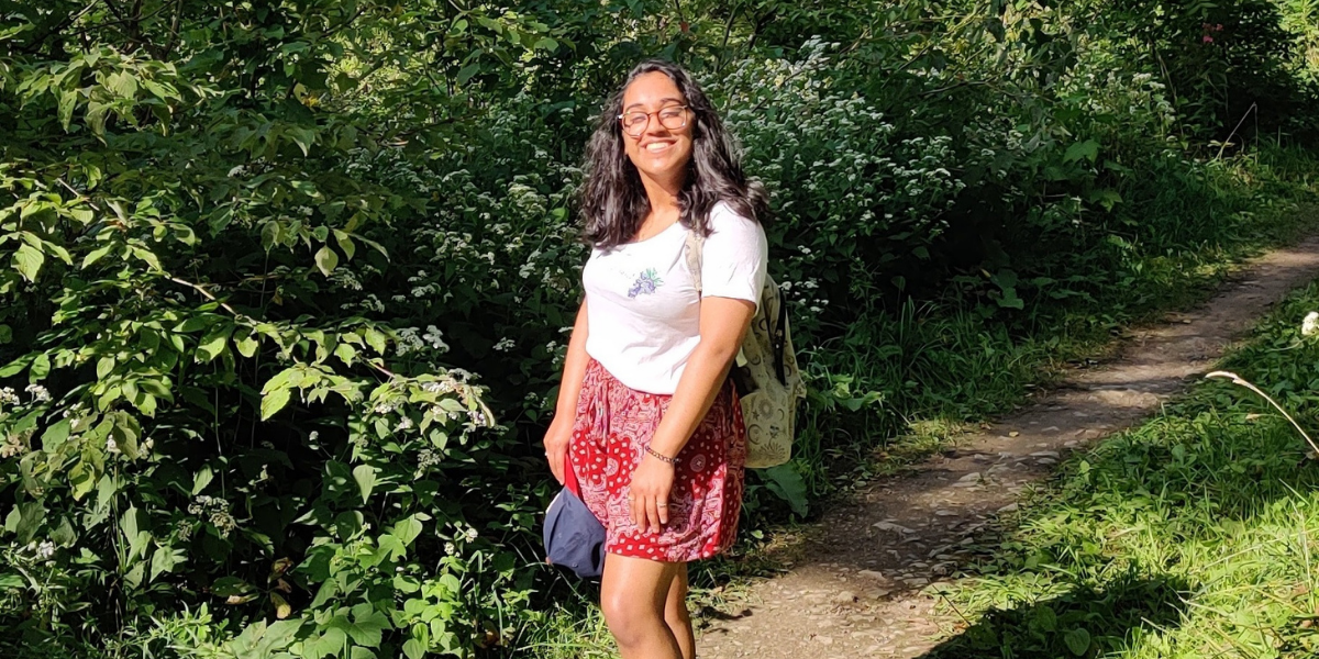 University of Waterloo Engineering co-op student Prithika smiling in a forest