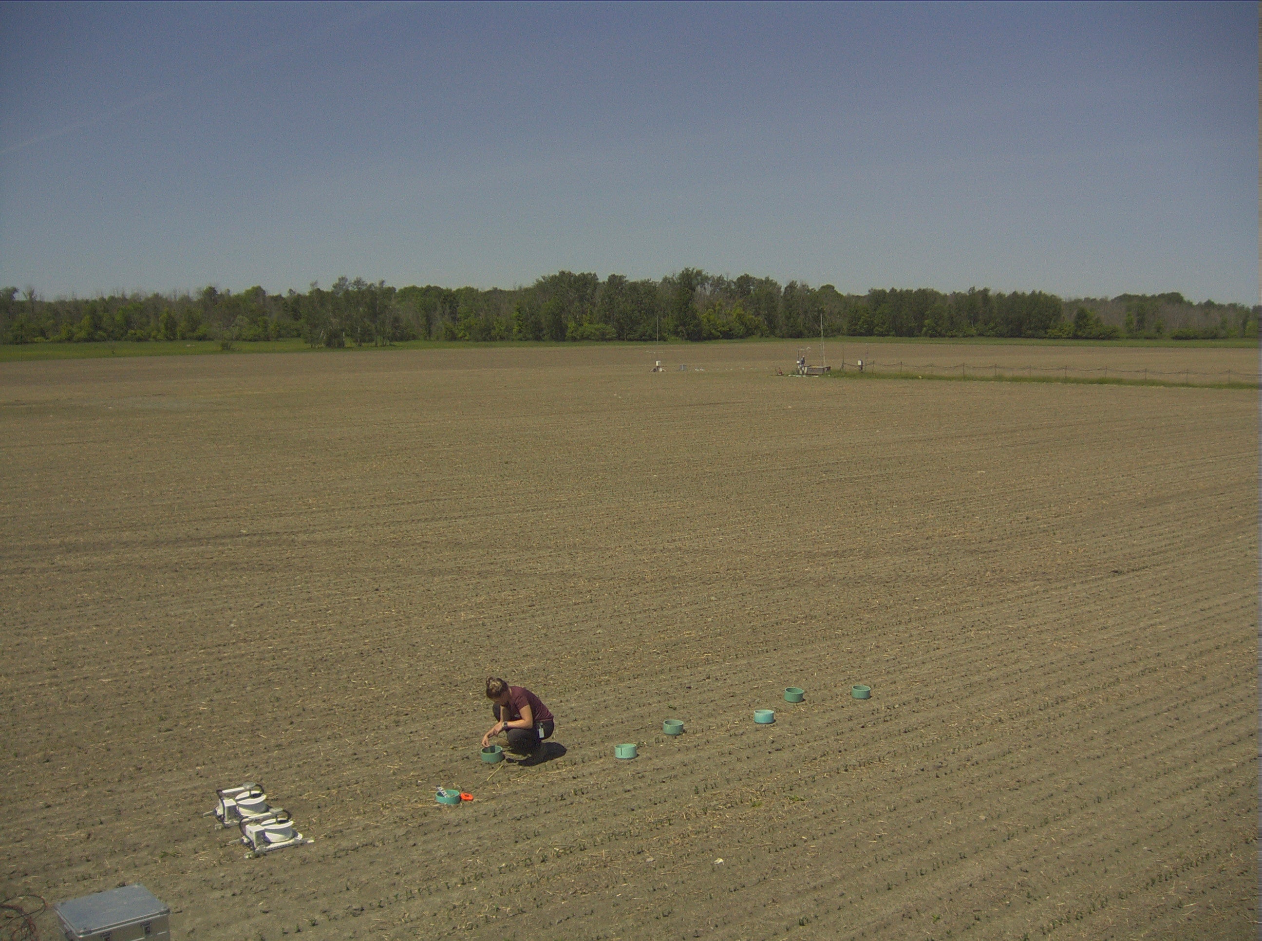 Sam capturing gas flux readings in a farm