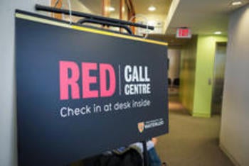 Sign indicating the Red Call Centre waiting area.