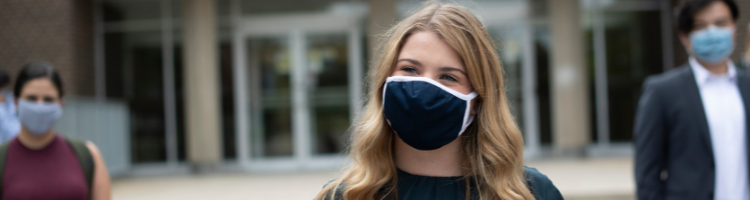 Waterloo co-op student wearing mask on campus