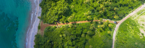 Birds eye view of an ocean meeting land