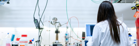 Female co-op student conducting research in a lab