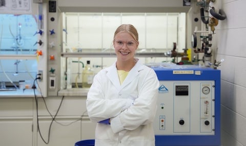 Allysa Greidanus posing in a science lab