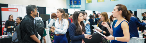 Students and employers engaging at job fair