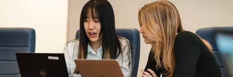 A co-op student and and an employer navigating the AOJ form on a computer