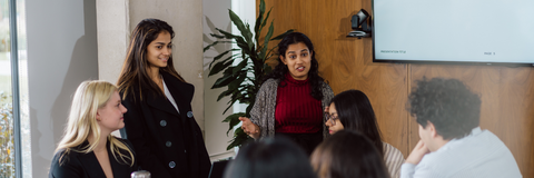 student presenting in front of other students