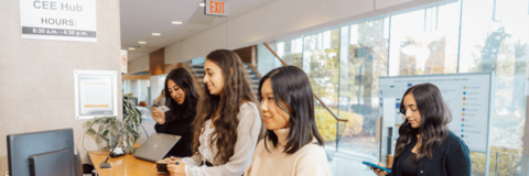 Waterloo students at CEE hub front desk 