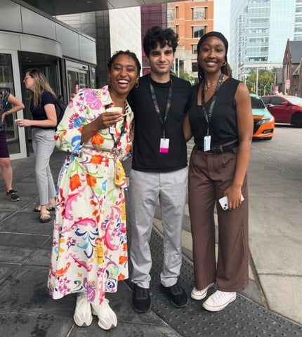 Aiden Sarrafzadeh smiling with others