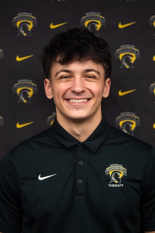 Daniel Proietti posing in front of Waterloo background