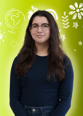 Francesca Girmenia posing in front of environment related icons