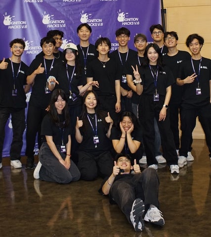 Franklin Ramirez posing with colleagues 