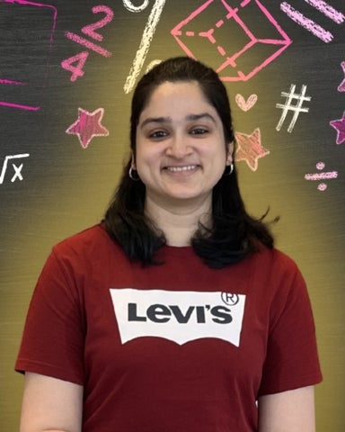 Pooja Krishan smiling/posing in front of math-related icons 