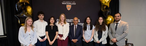 Group of co-op of the year winners posed infront of celebratory ballons