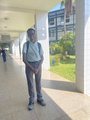 Zeeyaan Bourdeau standing outside of The Aga Khan Hospital