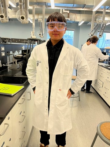 Jeff Ling in a white lab coat