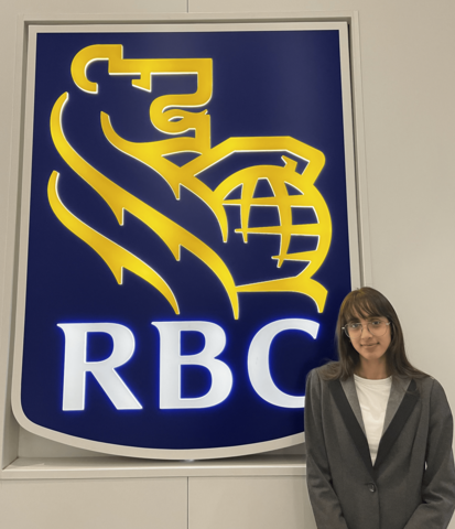 Ketna Khattar posing in front of an RBC sign