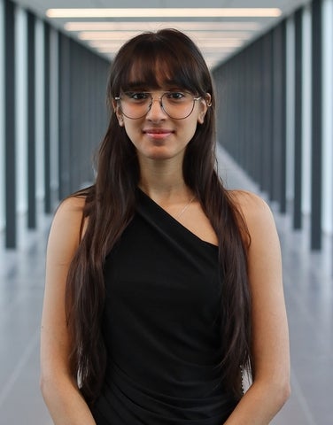 Ketna Khattar posing in a hallway