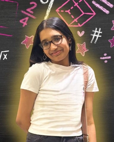 Krithika Kannan smiling/posing in front of math related icons