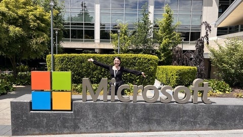 Padena Rasouli-Baghban posing with a Microsoft sign