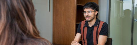 student talking to academic advisor