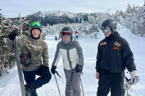Martin Bissonnette posing on a ski hill with friends