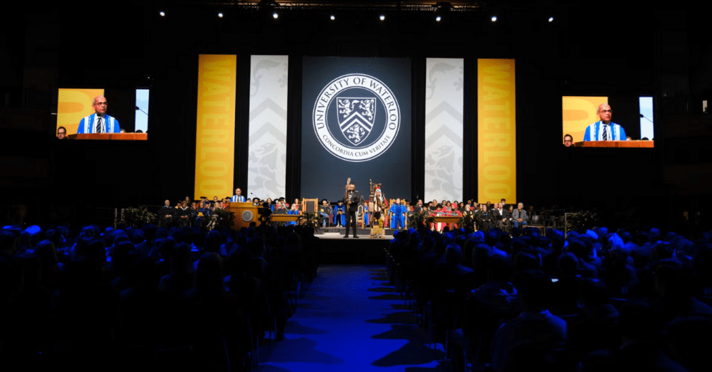People speaking on the convocation stage