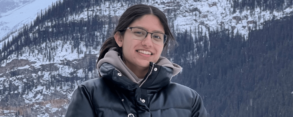 University of Waterloo Environment co-op student, Harshminder Sidhu, smiling outside.