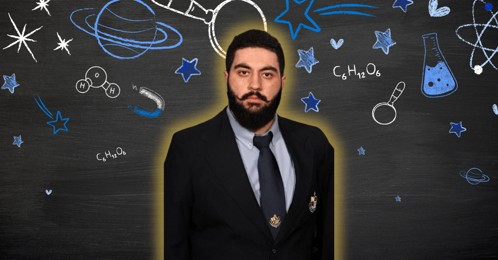 Danial Ghamari standing in front o science related icons