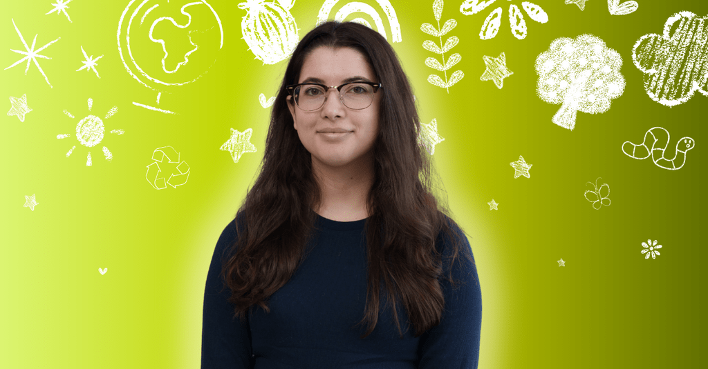 Francesca Girmenia posing in front of environment related icons