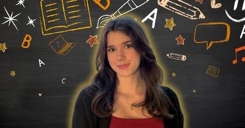 Chantelle Thierry smiling/posing in front of arts-related icons 