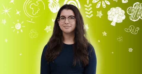 Francesca Girmenia posing in front of environment related icons