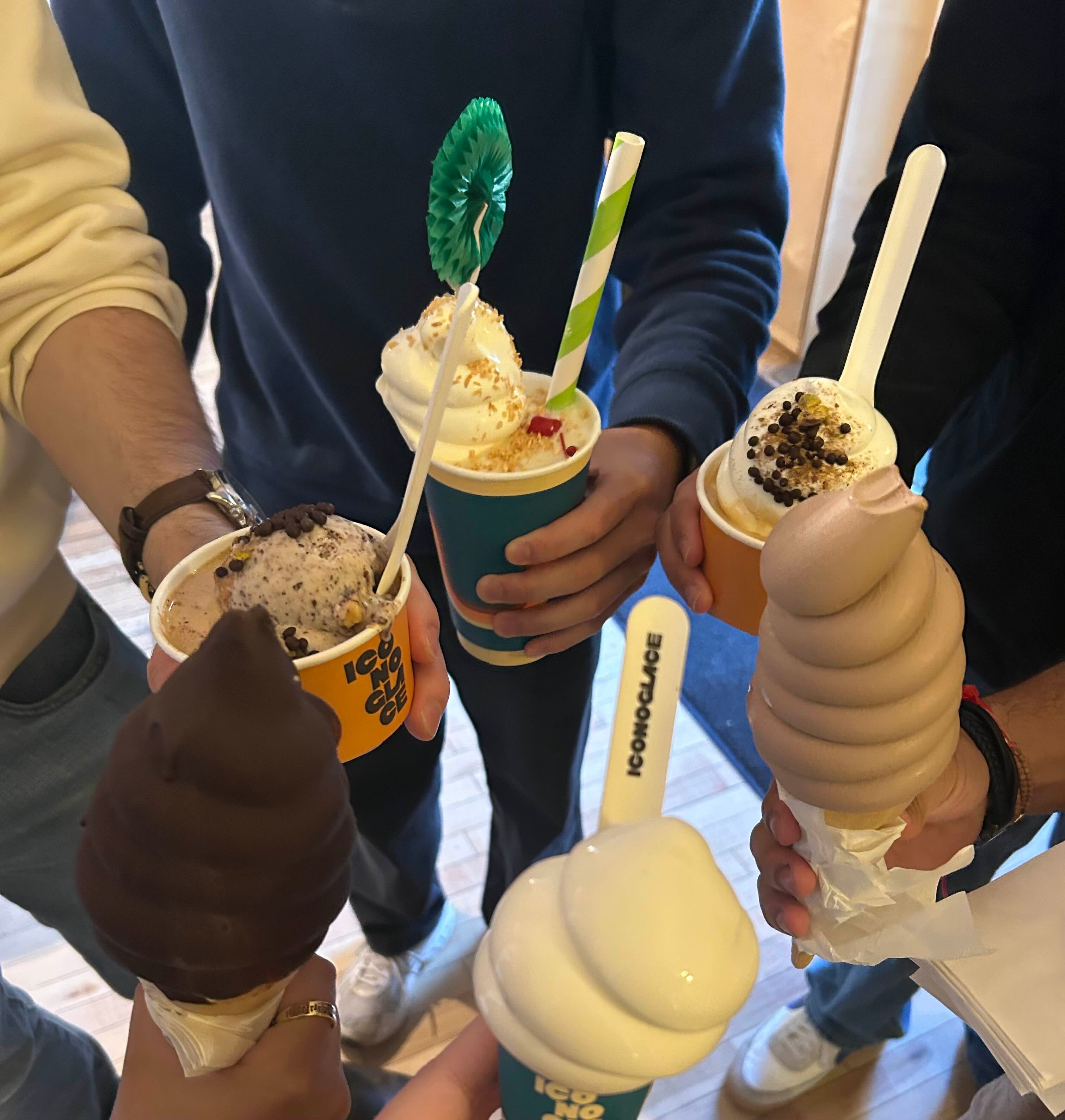 students holding ice-cream in a circle 