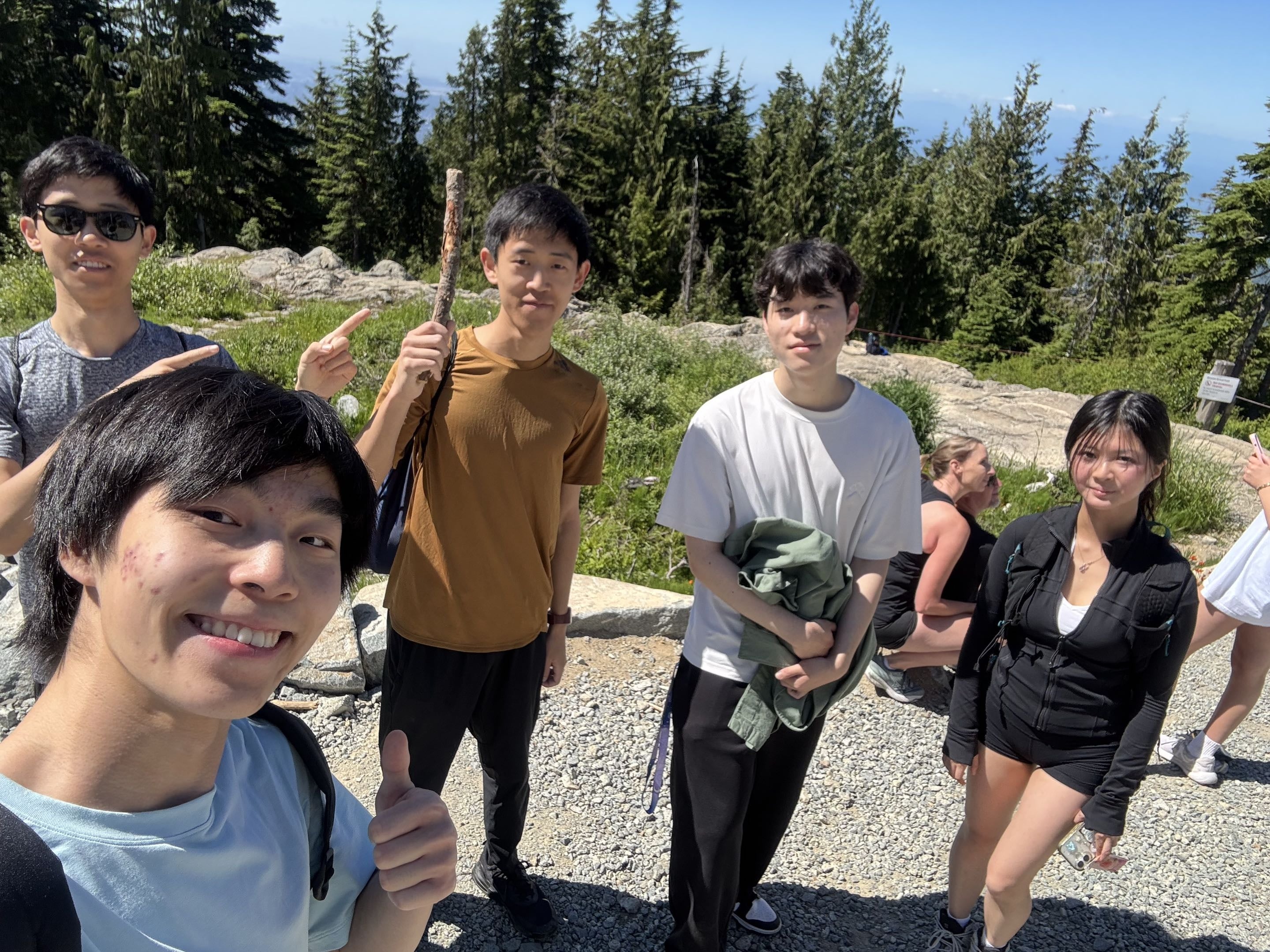 students posing on a hike
