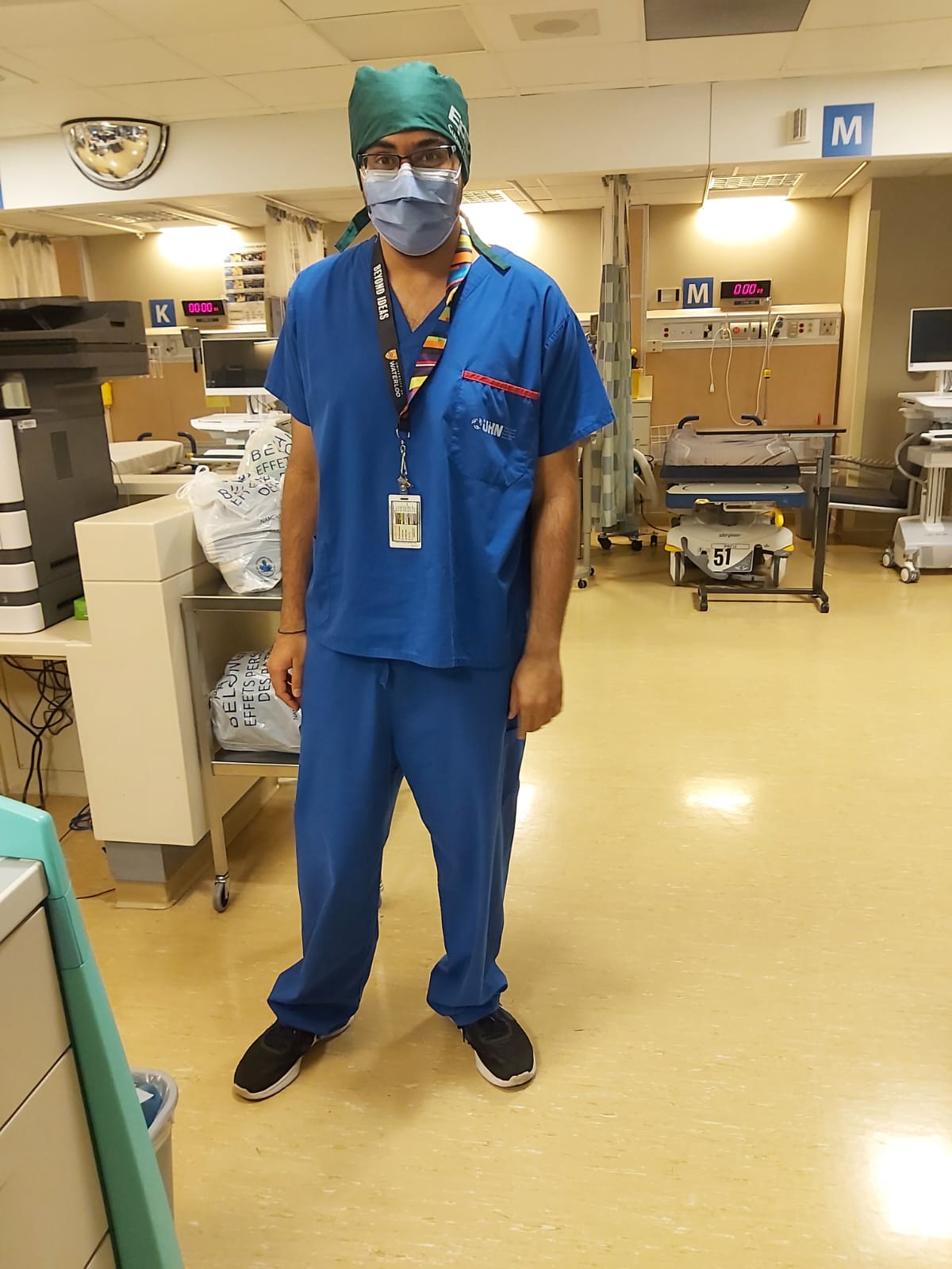 Rahul posing in scrubs 