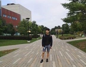 Everett posing for a photo on the University of Waterloo campus