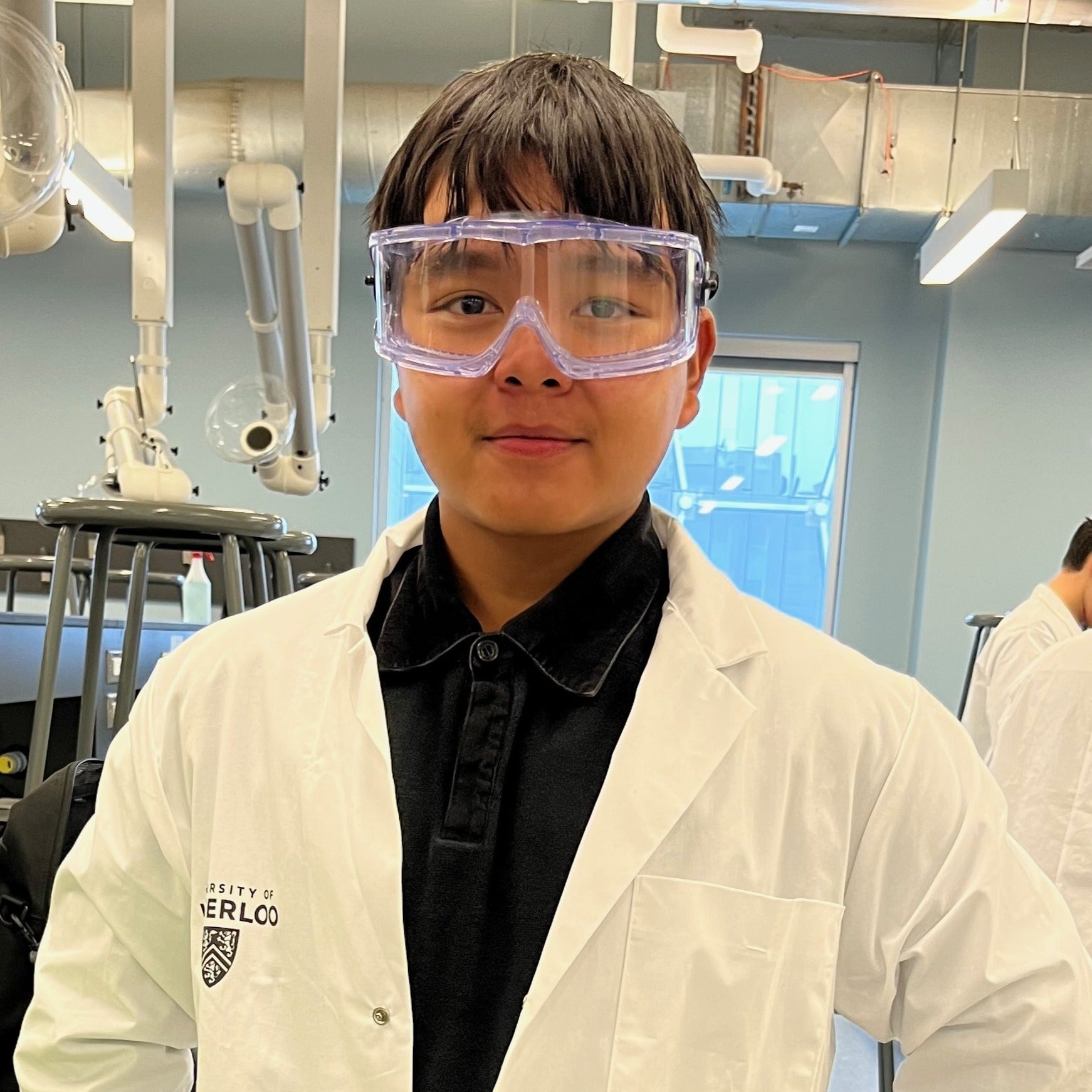 Jeff Ling in a white lab coat