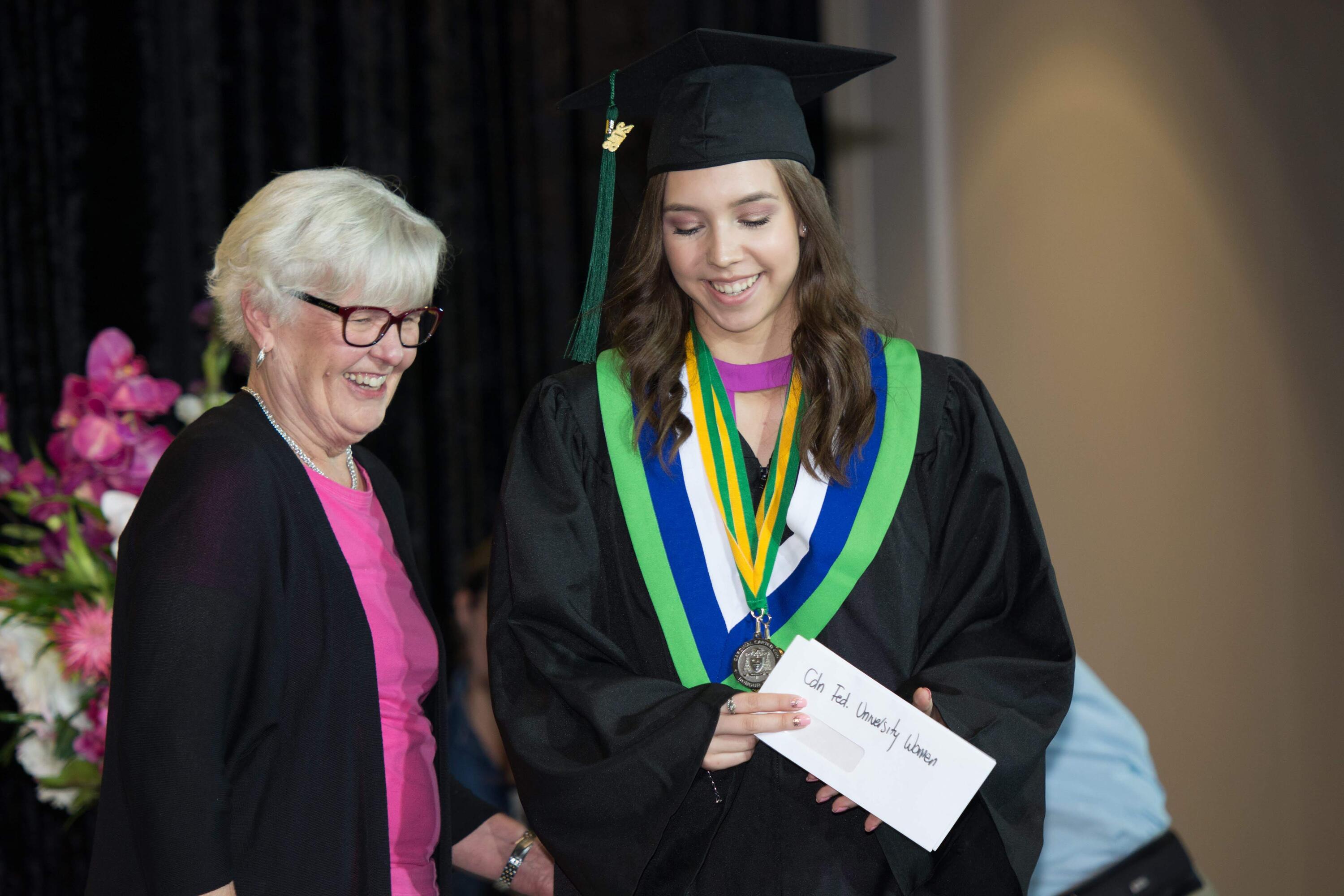 Anna on stage at Graduation 