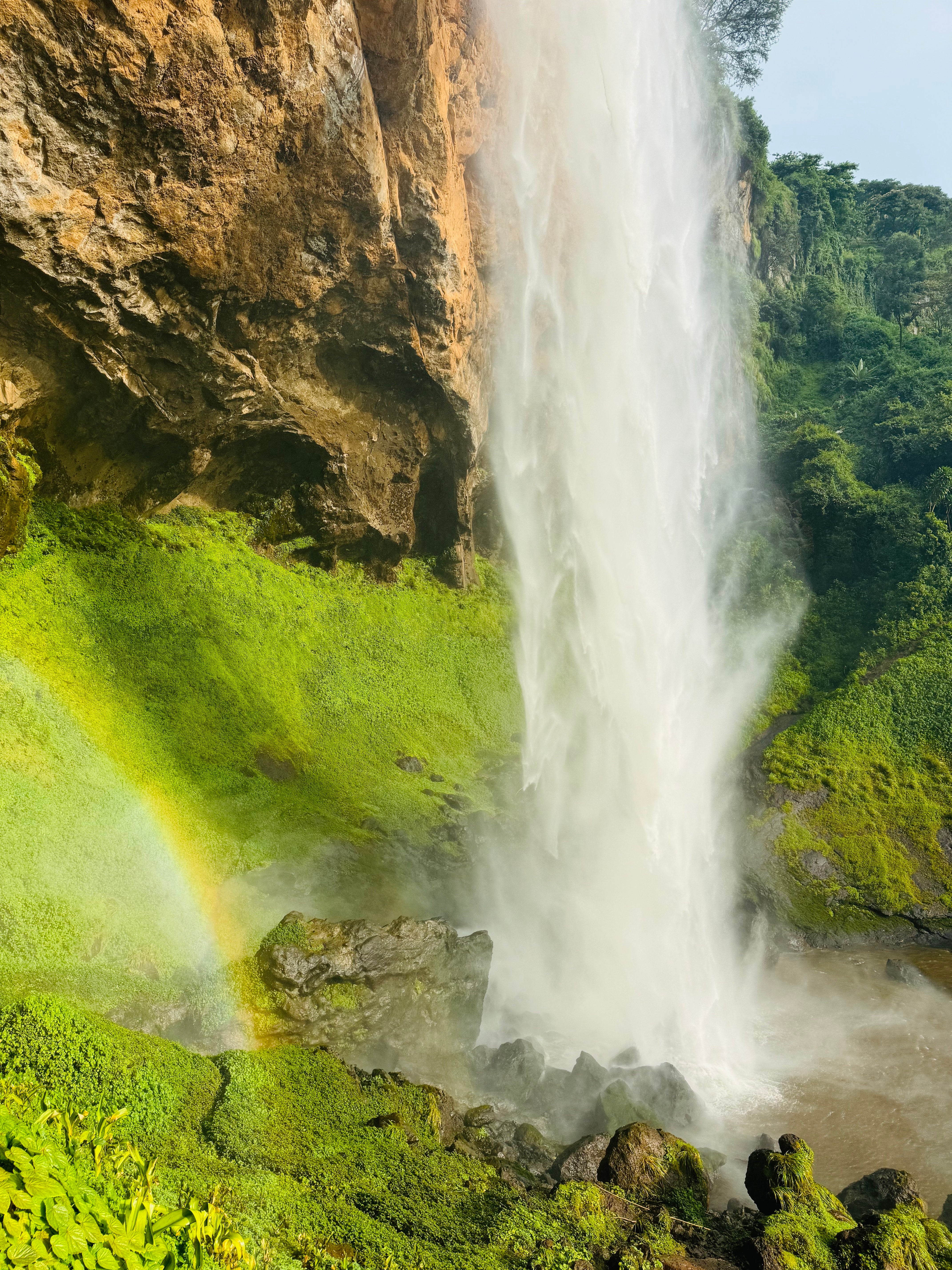 Waterfall with a rainbow at the bottom