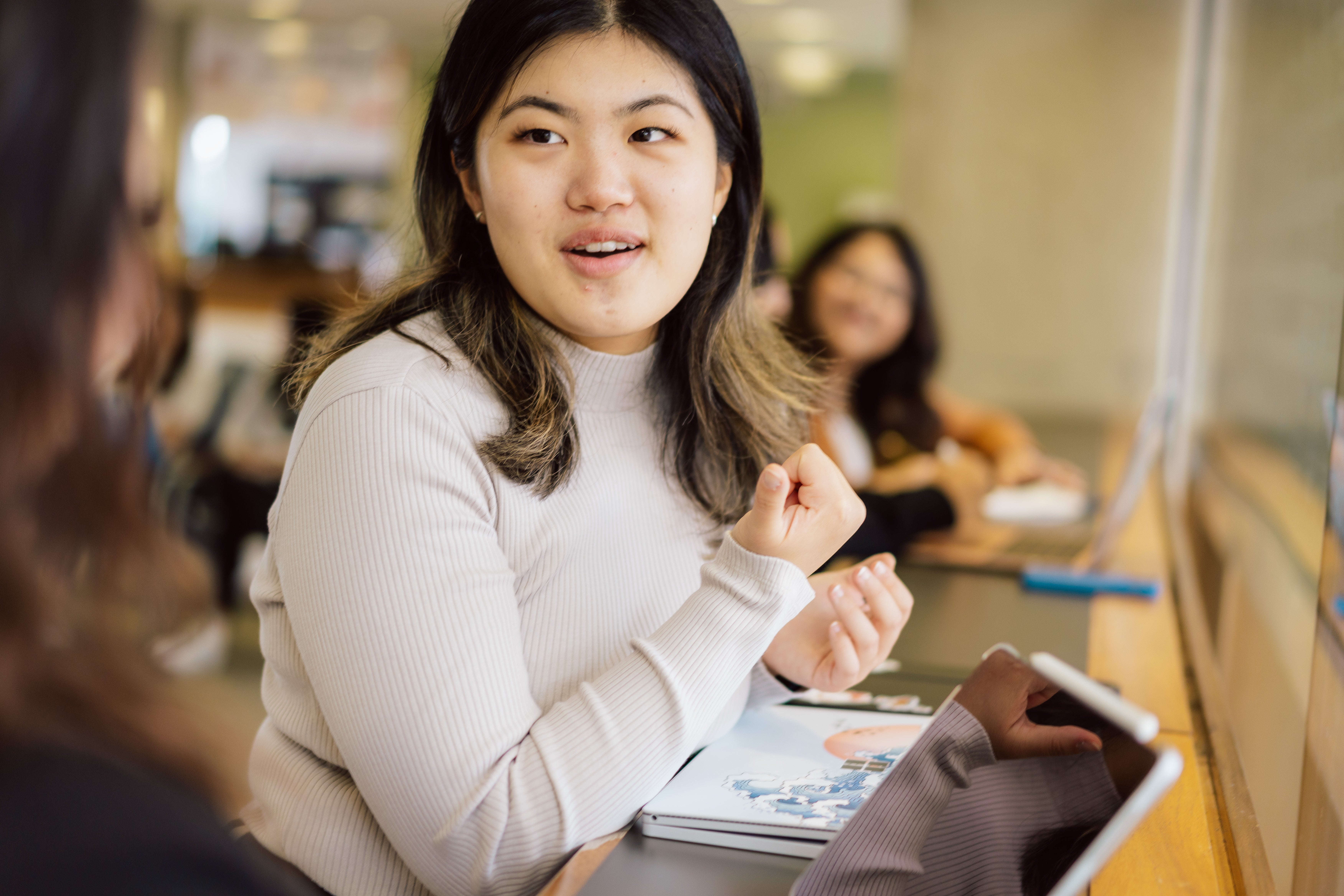 woman sitting at table