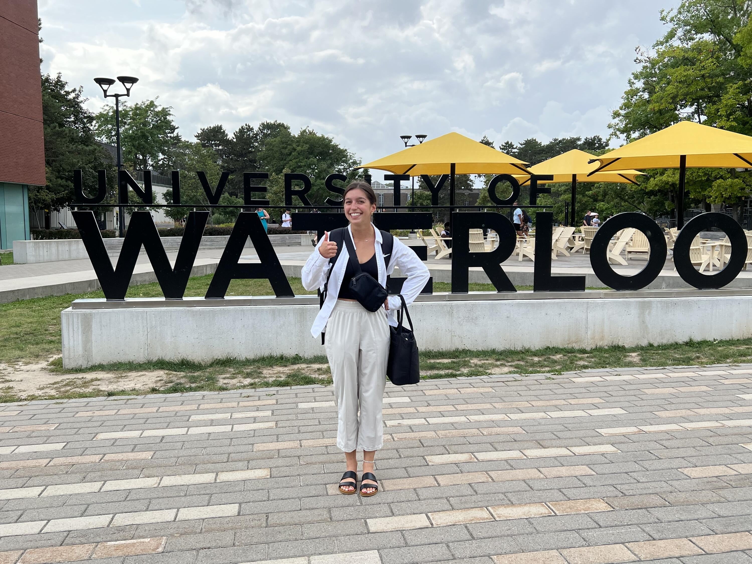 Vanessa in front of the Waterloo sign