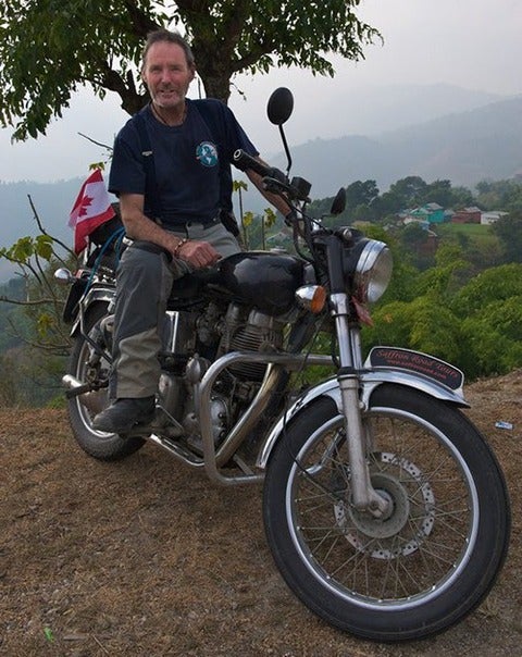 Mike Egan on a motorcycle