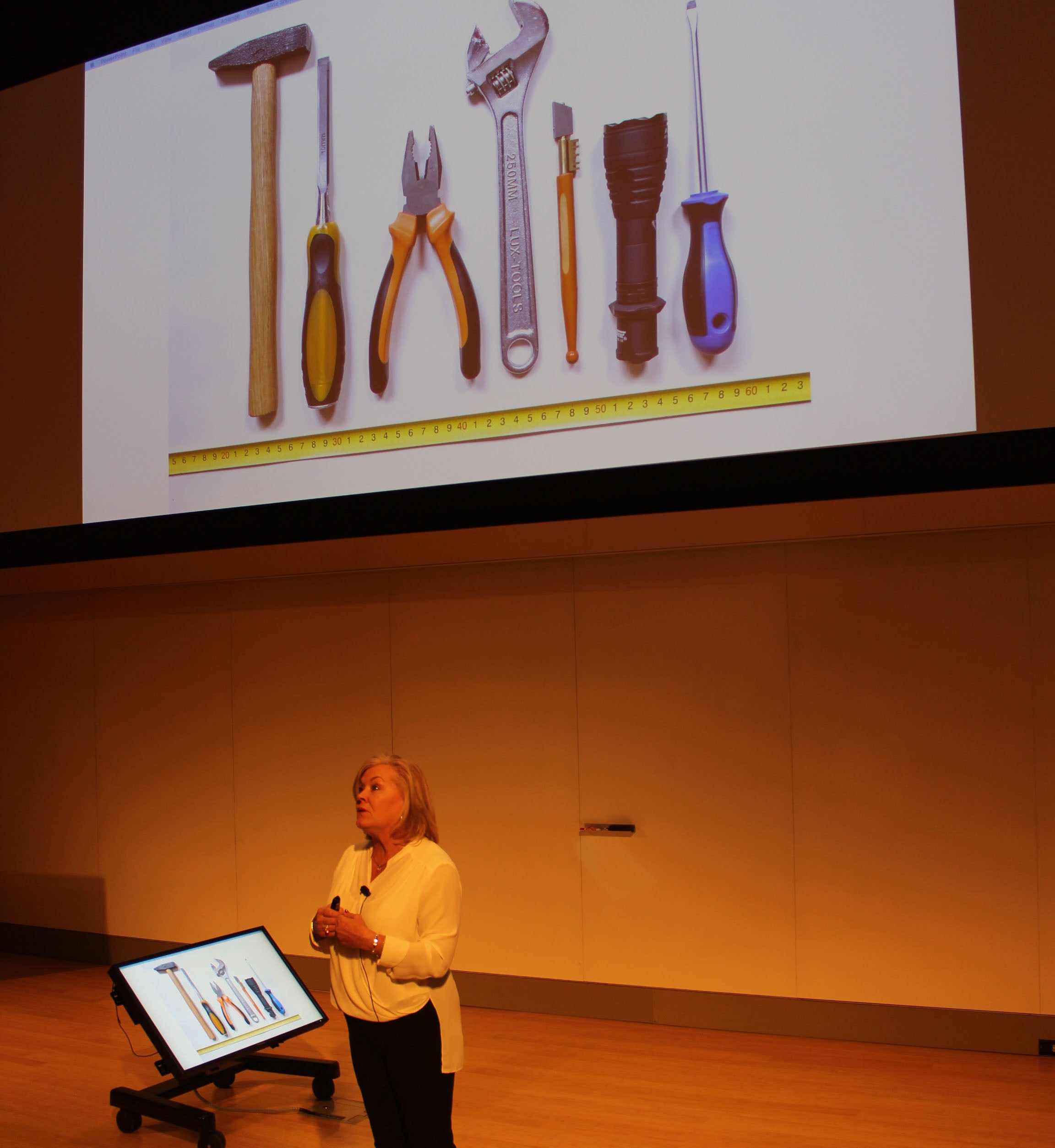 Sherry Shannon-Vanstone and a slide in her presentation showing tools. 