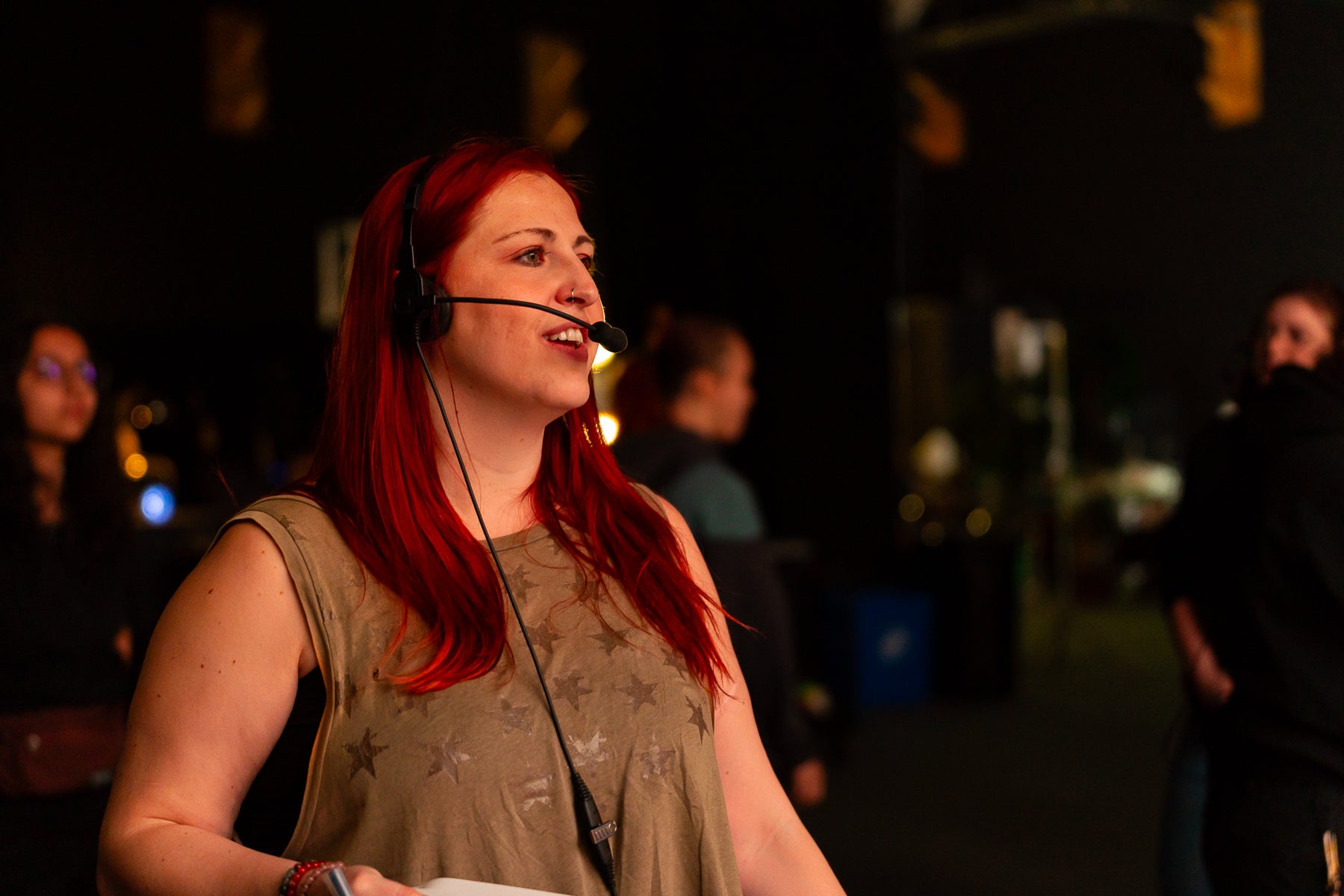 Emily Schooley wearing a headset.