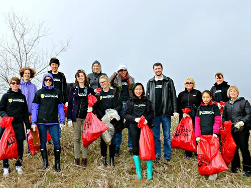 Students, staff, and faculty come together for a community cleanup