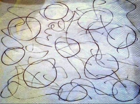Circles and lines drawn on a napkin