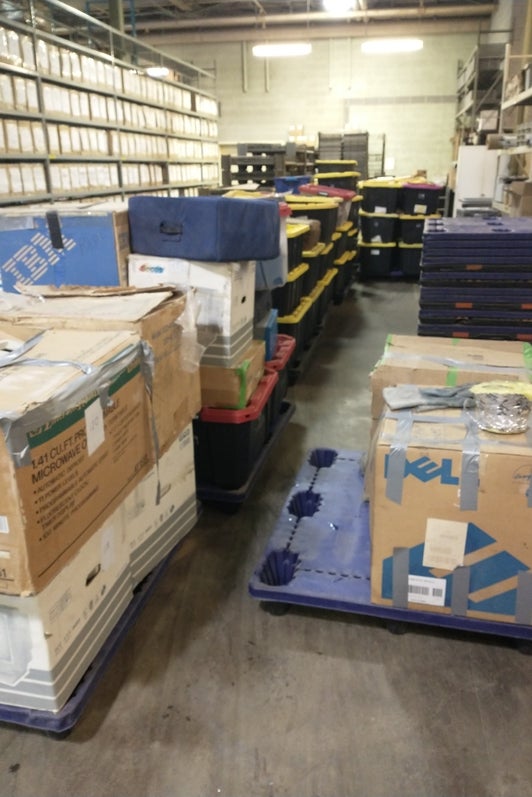 Tom Conrad donation unloaded into Central Stores