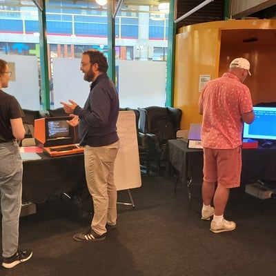Visitors at Justus' exhibit