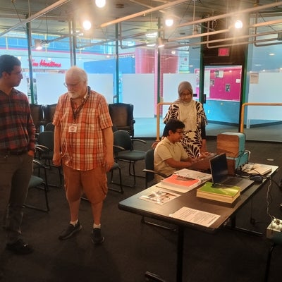 Michael Gardi discusses with guest
